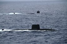 PACIFIC OCEAN (July 12, 2025) – The Los Angeles-class fast-attack submarine USS Santa Fe (SSN 763) and a Japan Maritime Self-Defense Force (JMSDF) submarine steam alongside one another during Submarine Exercise (SUBEX) 25-1, in the Pacific Ocean, July 12. SUBEX 25-1 was a two-day exercise between the U.S. Navy and JMSDF in the vicinity of Yokosuka to advance joint submarine capabilities and operations. Commander, Submarine Group 7 directs forward-deployed, combat capable forces across the full spectrum of undersea warfare throughout the Western Pacific, Indian Ocean, and Arabian Sea. (Photo courtesy of JMSDF)