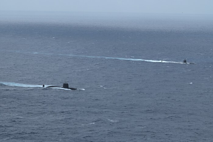 The Los Angeles-class fast-attack submarine USS Santa Fe (SSN 763) and a Japan Maritime Self-Defense Force (JMSDF) submarine steam alongside one another during Submarine Exercise (SUBEX) 25-1 in the Pacific Ocean, July 12, 2025.