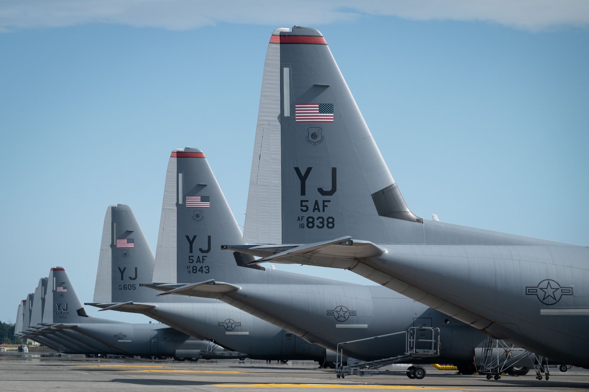 U.S. Air Force C-130J Super Hercules assigned to the 36th Airlift Squadron stand by for mission operations in support of Department-Level Exercise 2025 as part of the 374th Air Expeditionary Wing at Yokota Air Base, Japan, July 14, 2025. Through this DLE, the Department of the Air Force is preparing to be a stronger, more lethal deterrent force, to provide an advantage against competitors and adversaries across all domains, and to ensure regional stability in the Indo-Pacific and beyond. (U.S. Air Force photo by Airman Kayla Karelas)