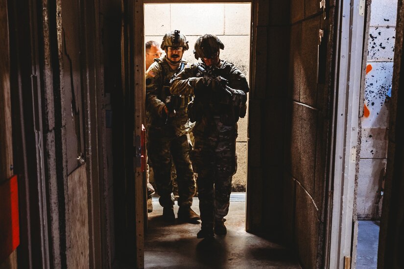 Soldiers with Bravo Company, 1st Battalion, 112th Infantry Regiment, 56th Stryker Brigade Combat Team practice various close quarter battle techniques at the live fire shoot house complex at Fort Indiantown Gap, Pennsylvania, June 10, 2025. The Soldiers conducted several iterations to practice movement while firing live rounds. (U.S. Army National Guard photo by Staff Sgt. Jonathan Campbell)