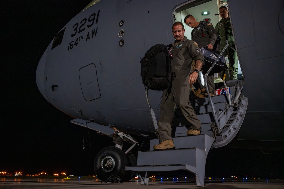 U.S. Airmen assigned to the 106th Rescue Wing disembark from a C-17 Globemaster III aircraft ahead of their support for exercise Resolute Force Pacific (REFORPAC) 2025 at Misawa Air Base, Japan, July 11, 2025. REFORPAC is part of the first-in-a-generation Department-Level Exercise series, employing more than 400 Joint and coalition aircraft and more than 12,000 members at more than 50 locations across 3,000 miles. (U.S. Air Force photo by Airman 1st Class Andre Medina)