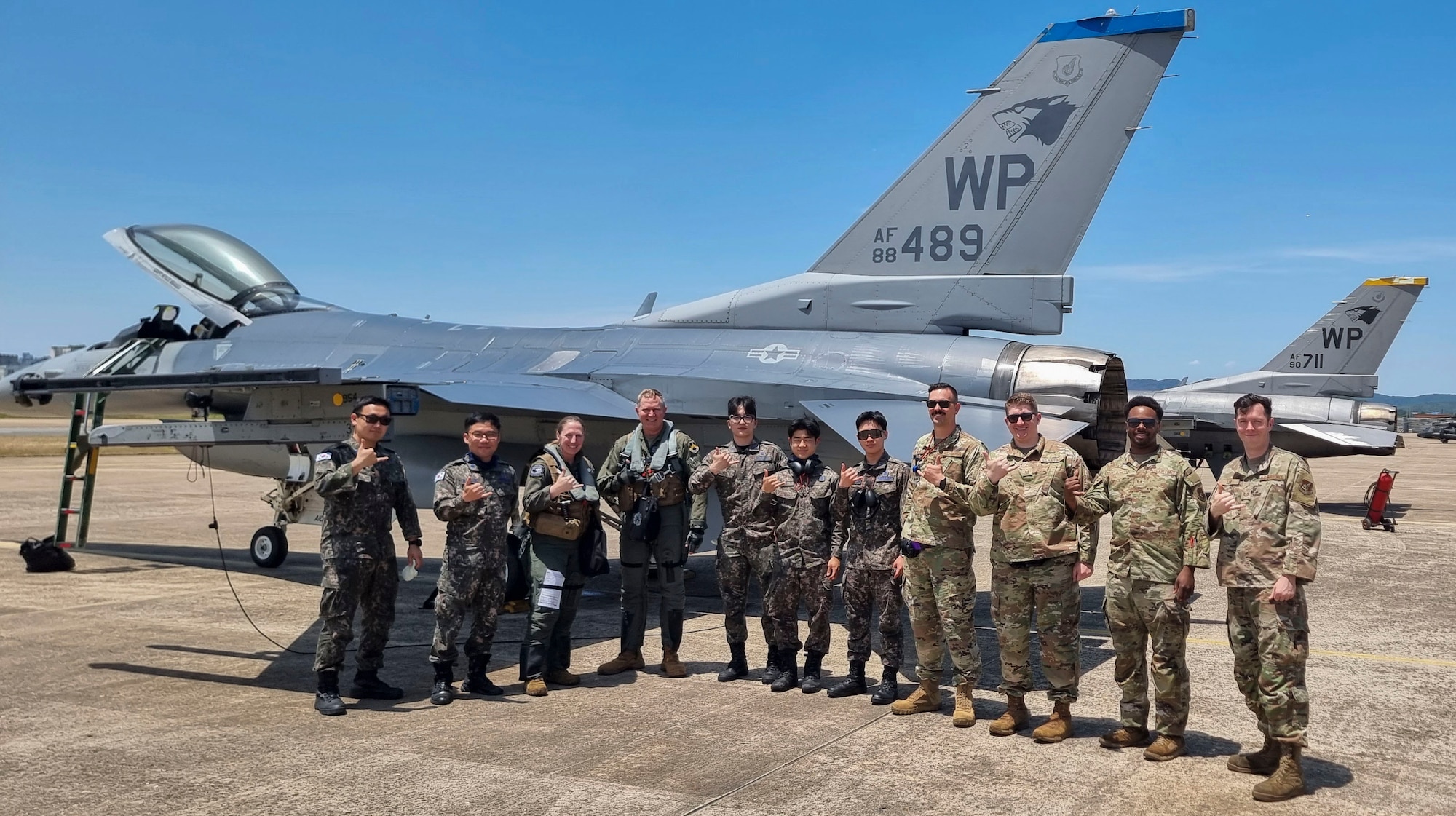 Members from the 8th Fighter Wing and the Republic of Korea Air Force 38th Fighter Group pose for a photo on the flightline at Daegu Air Base, Republic of Korea, June 11, 2025. The U.S. Air Force and ROKAF teams performed cross-servicing and expanded sortie generation interoperability between each other to develop and mature the capabilities of the two allies. (U.S. Air Force courtesy photo.)
