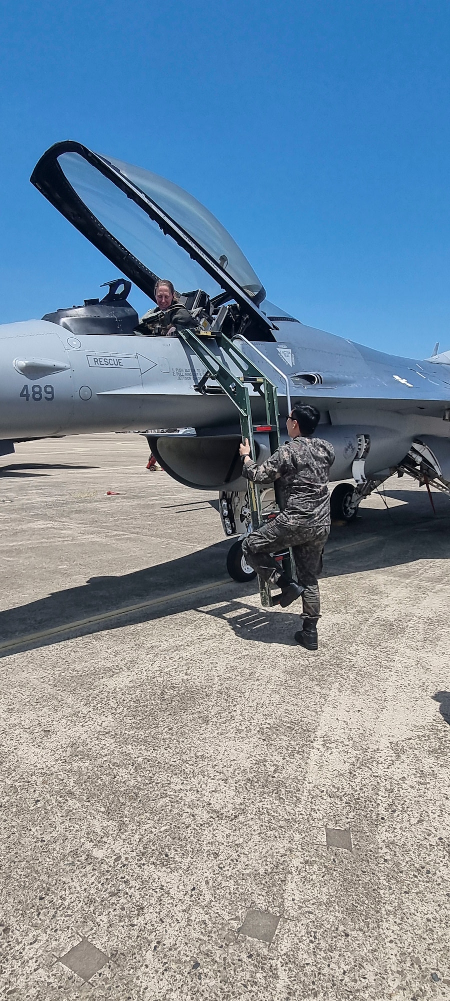 Col. Kathryn “Wolf” Gaetke, 8th Fighter Wing commander, prepares for a flight with the help of a Republic of Korea Air Force crew chief at Daegu Air Base, Republic of Korea, June 11, 2025. Gaetke led a flight of two F-16 Fighting Falcon aircraft to DAB, where ROKAF maintainers from the 38th Fighter Group
received and serviced the aircraft. (U.S. Air Force courtesy photo.)