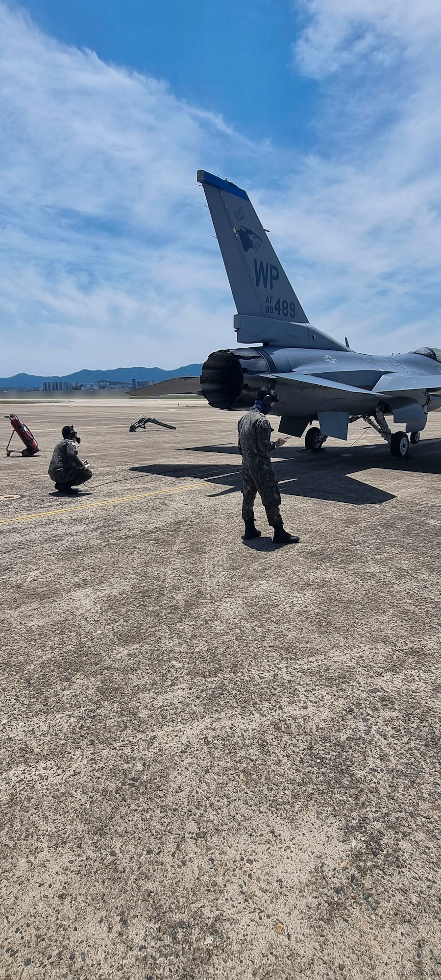 Maintainers from the Republic of Korea Air Force 38th Fighter Group inspect a U.S. Air Force F-16 Fighting Falcon aircraft at Daegu Air Base, Republic of Korea, June 11, 2025. This cross-servicing effort develops and matures the capabilities of the two allies to recover, service and launch each other’s aircraft in support of combat air operations. (U.S. Air Force courtesy photo.)