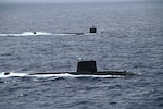 PACIFIC OCEAN (July 12, 2025) – The Los Angeles-class fast-attack submarine USS Santa Fe (SSN 763) and a Japan Maritime Self-Defense Force (JMSDF) submarine steam alongside one another during Submarine Exercise (SUBEX) 25-1, in the Pacific Ocean, July 12, 2025. SUBEX 25-1 was a two-day exercise between the U.S. Navy and JMSDF in the vicinity of Yokosuka to advance joint submarine capabilities and operations. CSG 7 directs forward-deployed, combat capable forces across the full spectrum of undersea warfare throughout the Western Pacific, Indian Ocean, and Arabian Sea. (Photo courtesy of JMSDF.)