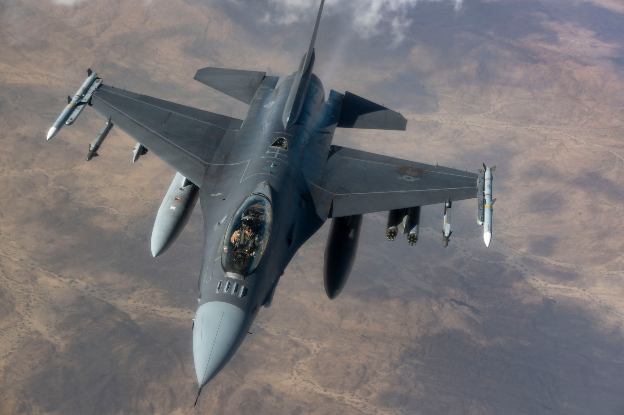 A U.S. Air Force F-16 Fighting Falcon departs after refueling.