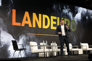 Giorgi Tskhakaia, adviser to the Minister of Digital Tranformation of Ukraine, speaks to an audience of Allies and industry personnel during a Keynote Presentation at LANDEURO at the RheinMain CongressCenter in Wiesbaden, Germany, July 16, 2025. LANDEURO brings together industry and Allies to shape and accelerate industrial resilience, strengthening NATO’s force posture, and reinforcing global deterrence.  LANDEURO is the launchpad, and USAREUR-AF is the test bed for joint transformation. (U.S. Army photo by Sgt. 1st Class Christopher Osburn)