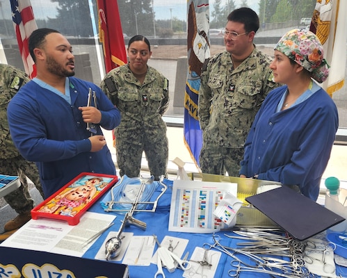 Hear all about it...For Sailors assigned to Navy Medicine Readiness and Training Command Bremerton and other local commands who ever wondered about progressing into a Hospital Corps field of expertise, they were recently afforded that opportunity. They learned firsthand on a number of specialty jobs at a NEC [Navy Enlisted Classification] Rating Fair, July 14, 2025. The event was hosted by NMRTC Bremerton’s Junior Enlisted Association and was designed to for all Navy ranks and rates to discover local resources for career growth and also establish mentorship connections (Official Navy photo by Mass Communication Specialist 2nd Class Jennifer Benedict, NHB/NMRTC Bremerton public affairs).