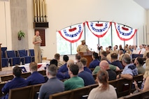 Vice Adm. Johnny Wolfe, Director, Strategic Systems Programs, speaks to an audience of government, military, and industry partners during a celebratory event hosted by Strategic Weapons Facility, Atlantic (SWFLANT) at the Naval Submarine Base Kings Bay, Ga. chapel on July 3, in honor of the 70th anniversary of Strategic Systems Programs (SSP).