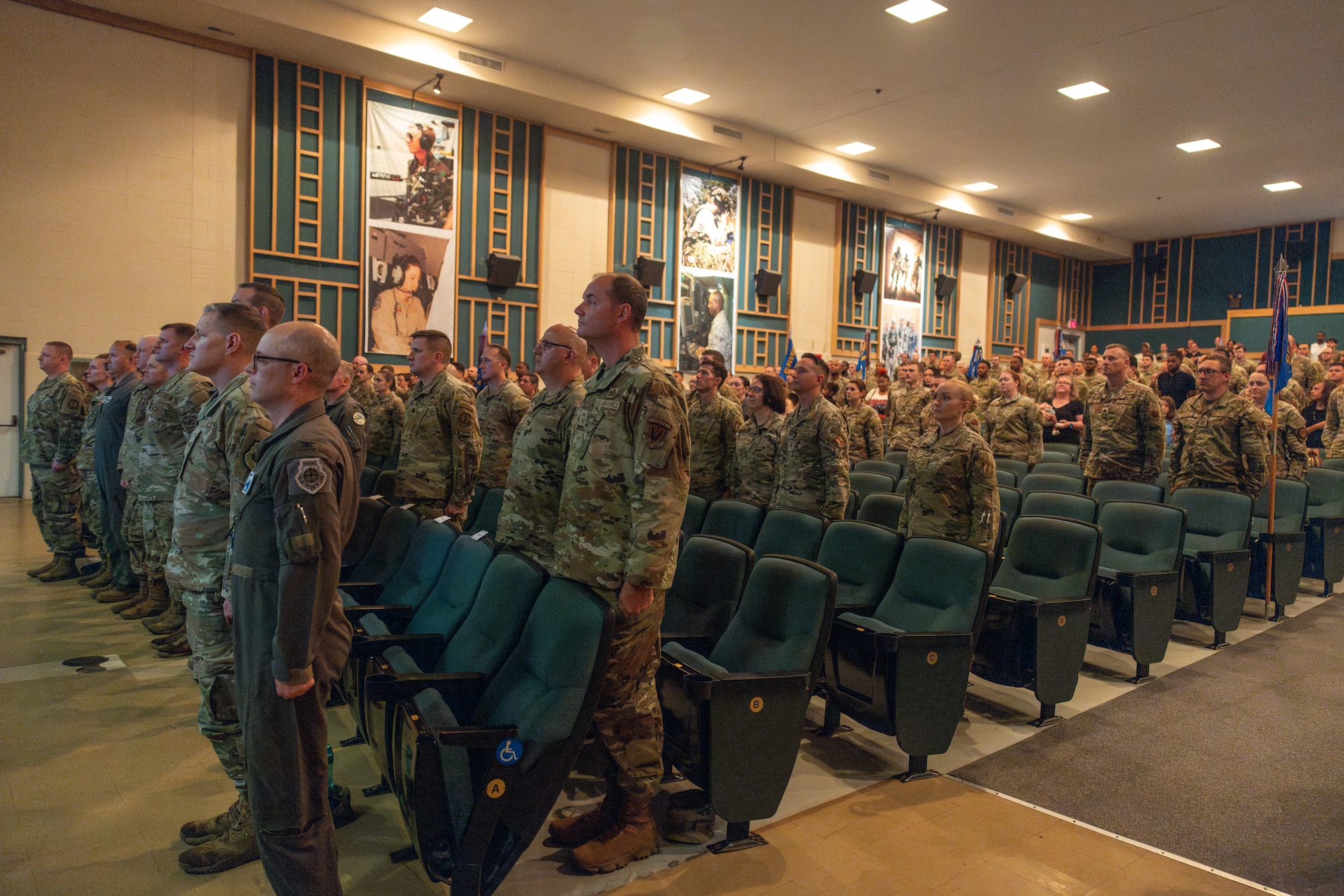 Airmen stand at attention during promotion ceremony