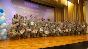 Tinker Airmen pose for a photo during a celebration at Tinker Air Force Base