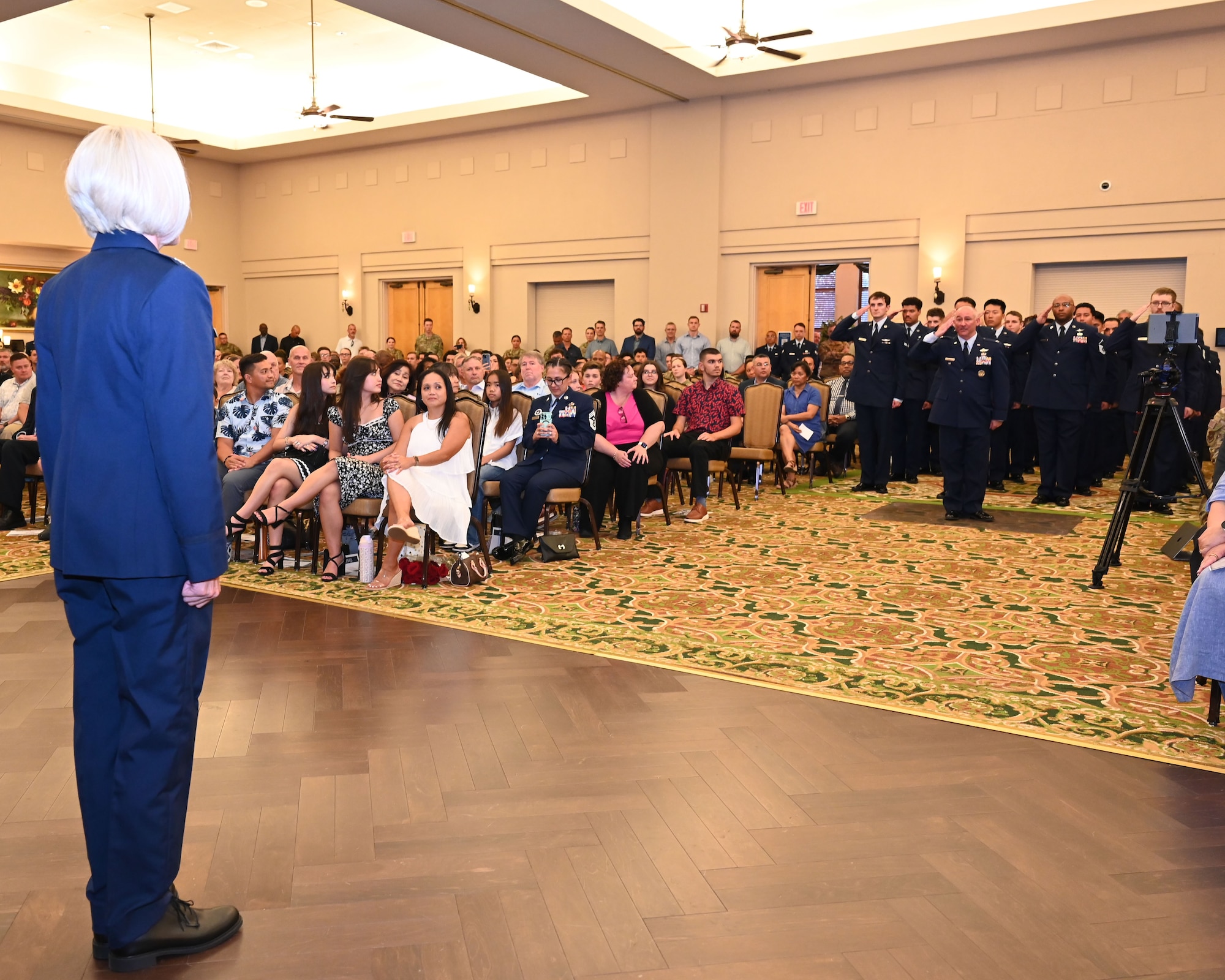 688th CW commander receives first salute from her command.