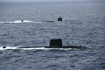 PACIFIC OCEAN (July 12, 2025) – The Los Angeles-class fast-attack submarine USS Santa Fe (SSN 763) and a Japan Maritime Self-Defense Force (JMSDF) submarine steam alongside one another during Submarine Exercise (SUBEX) 25-1, in the Pacific Ocean, July 12, 2025. SUBEX 25-1 was a two-day exercise between the U.S. Navy and JMSDF in the vicinity of Yokosuka to advance joint submarine capabilities and operations. CSG 7 directs forward-deployed, combat capable forces across the full spectrum of undersea warfare throughout the Western Pacific, Indian Ocean, and Arabian Sea. (Photo courtesy of JMSDF.)