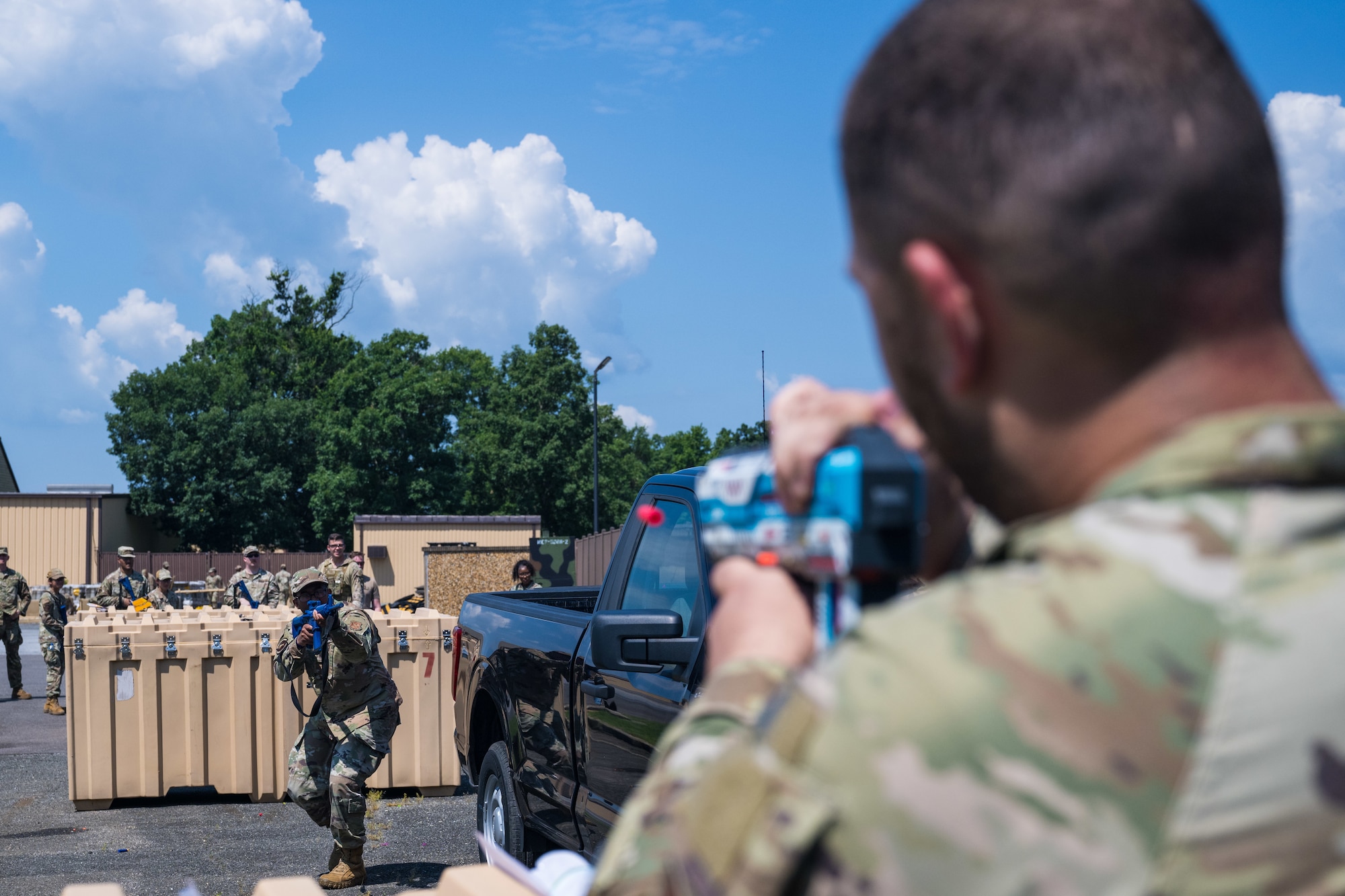 A U.S. Airman assigned to the 316th Civil Engineer Squadron, acts as an opposing force during the  individual movement techniques event.