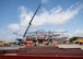 Contractors raise the final steel beam into place at the future Dunn Dental Clinic during a topping-out ceremony at Joint Base San Antonio-Lackland, Texas, July 16, 2025.