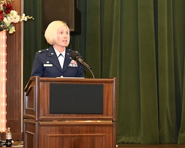 New 688th CW commander speaks to audience.