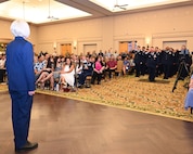 688th CW commander receives first salute from her command.