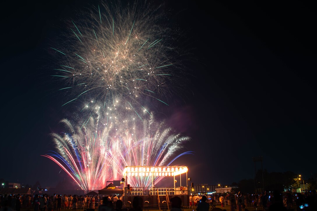 Sailors assigned to Naval Air Facility (NAF) Atsugi and members from the local community watch fireworks during the 2024 Bon Odori Festival held onboard the installation.