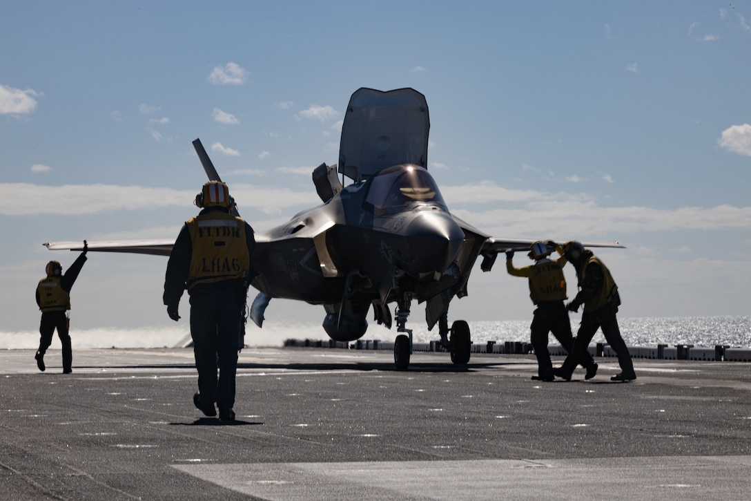 A U.S. Marine Corps F-35B Lightning II aircraft assigned to Marine Fighter Attack Squadron (VMFA) 242, 31st Marine Expeditionary Unit, taxis on a flight deck during flight operations as a part of Talisman Sabre 25, aboard the amphibious assault ship USS America (LHA 6), in the Coral Sea, July 13, 2025. Marine F-35Bs bring a 5th generation multi-discipline strike capability to support combined-joint all domain operations in key maritime terrain. Talisman Sabre is the largest bilateral military exercise between Australia and the United States advancing a free and open Indo-Pacific by strengthening relationships and interoperability among key allies and partners, while enhancing our collective capabilities to respond to a wide array of potential security concerns. (U.S. Marine Corps photo by Sgt. Peter Rawlins)