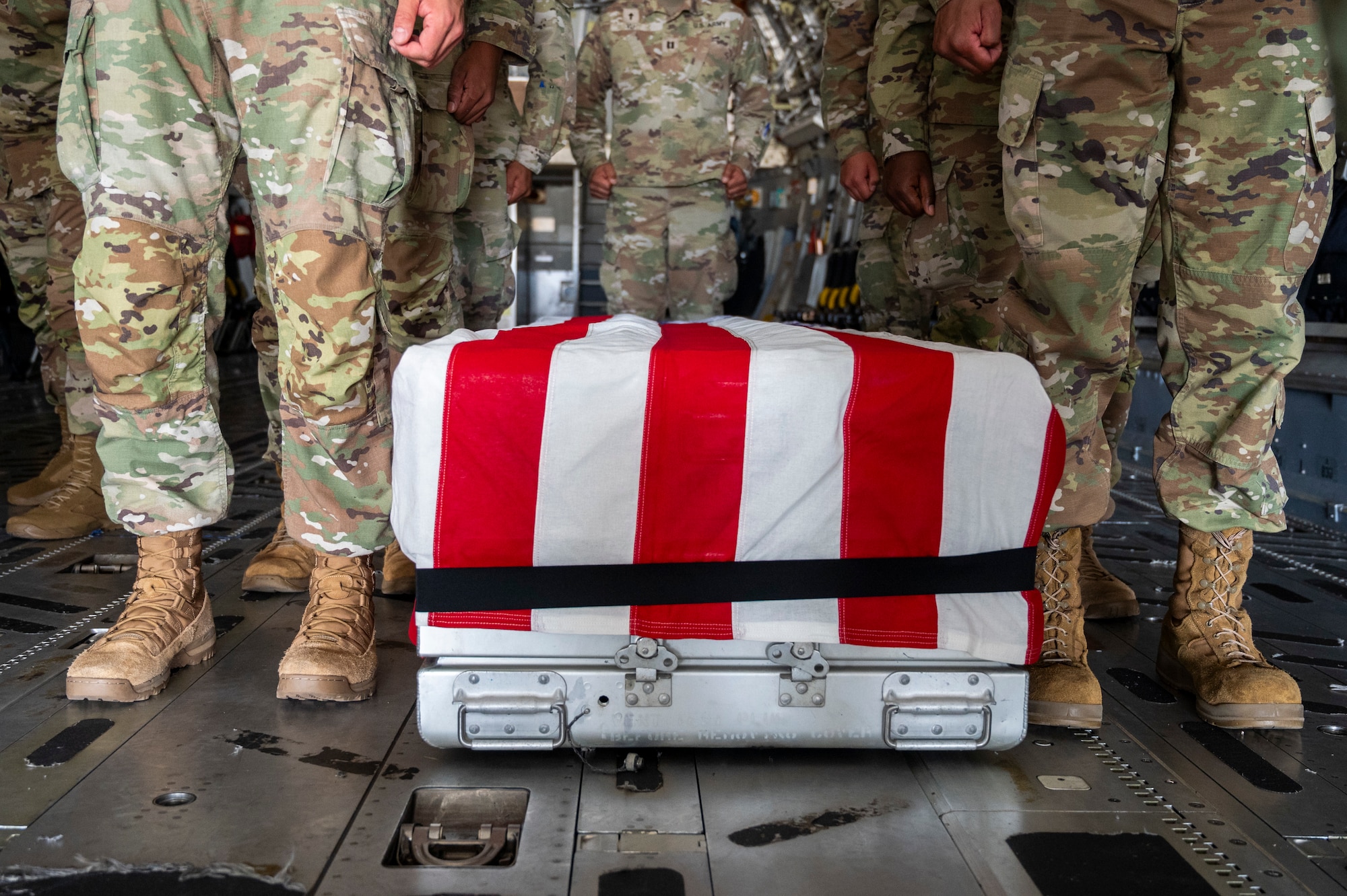 U.S. Airmen and Soldiers from Joint Base Lewis-McChord, finish a simulated dignified transfer ramp ceremony at JBLM, Washington, July 10, 2025.