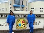 Carol Urbano (left) and Metuschelah Francois (right), phlebotomy externs, pose in front of Jacksonville MEPS. The Jacksonville MEPS team welcomed the first two phlebotomy externs to help assist with collecting vitals, drawing blood and urine samples and conducting vision and audio screenings.