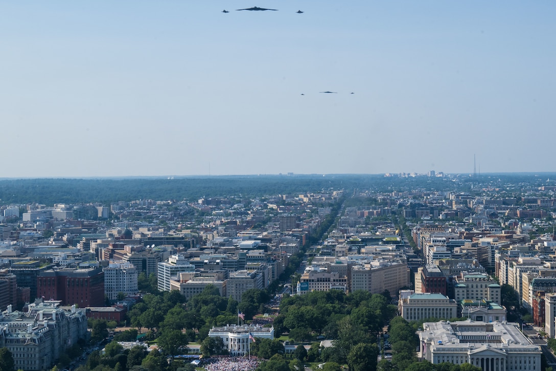 Two U.S. Air Force B-2 Spirits, accompanied by two F-35A Lightning IIs, and two F-22 Raptors, during a flyover over the White House.