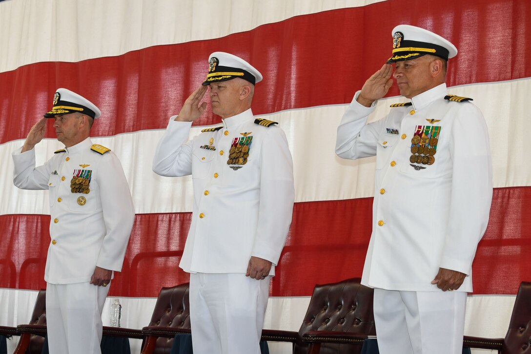250411-N-DG679-1080
JACKSONVILLE, Fla. (April 11, 2025) (From left) Rear Adm. Joseph Hornbuckle, commander, Fleet Readiness Centers; Capt. William Palmer, outgoing commanding officer of Fleet Readiness Center Southeast (FRCSE) and Capt. Michael Windom, incoming commanding officer of FRCSE, salute the national ensign during the parading of the colors at the FRCSE change of command ceremony. A Navy change of command ceremony is a formal event that signifies the transfer of authority and responsibility from one commanding officer to another. (U.S. Navy photo by Toiete Jackson)