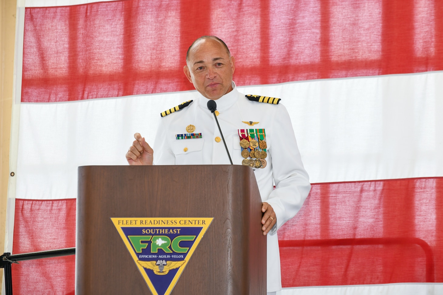 250411-N-DG679-1229
JACKSONVILLE, Fla. (April 11, 2025) Capt. Michael Windom, incoming commanding officer of Fleet Readiness Center Southeast (FRCSE), addresses guests during a change of command ceremony. During the ceremony Windom relieved Capt. Al Palmer as FRCSE commanding officer. A Navy change of command ceremony is a formal event that signifies the transfer of authority and responsibility from one commanding officer to another. (U.S. Navy photo by Toiete Jackson)