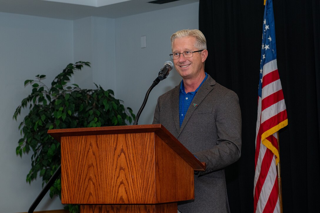 250711-N-DG679-1013
JACKSONVILLE, Fla. (July 11, 2025) 
Clint Batten, Fleet Readiness Center Southeast’s (FRCSE) production director, addresses the audience during FRCSE’s 2025 Trades Apprenticeship Program graduation ceremony hosted at University of North Florida. This year FRCSE graduated 26 apprentices from the program. FRCSE’s apprenticeship program is a paid, four-year work study that provides benefits and the opportunity to learn a journeyman-level trade. (U.S. Navy Photo by Toiete Jackson)