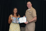 250711-N-DG679-1006
Alyssa Henry, a Fleet Readiness Center Southeast (FRCSE) 2025 graduating apprentice, accepts her journeyman certificate from FRCSE’s Executive Officer, Capt. Mike Freas. Henry is a newly designated journeyman-level aircraft mechanic. FRCSE’s apprenticeship program is a paid, four-year work study that provides benefits and the opportunity to learn a journeyman-level trade. (U.S. Navy Photo by Toiete Jackson)