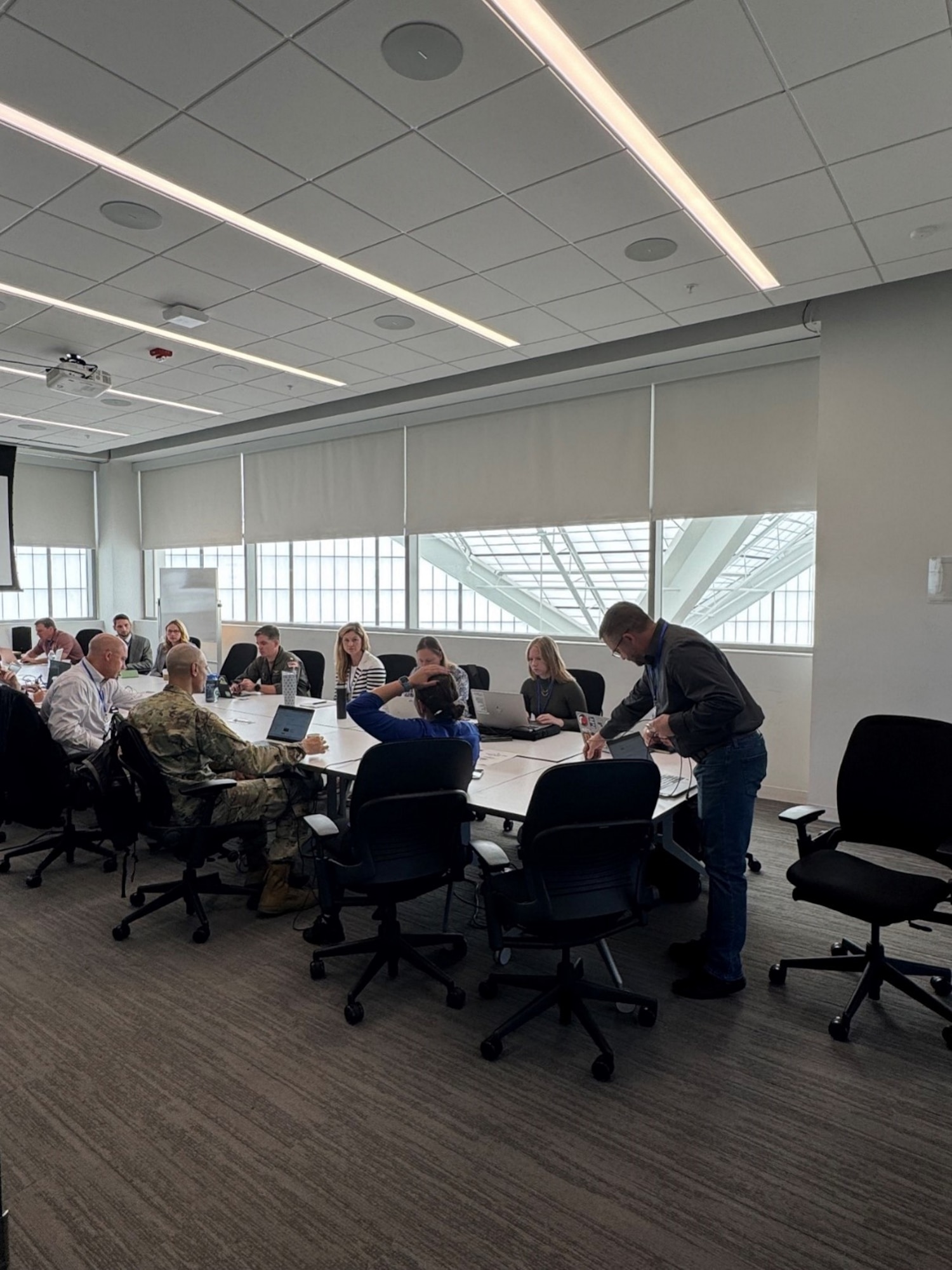 U.S. government officials at Space System Command’s Commercial Augmentation Space Reserve (CASR)’s Space Domain Awareness wargame work on acting as “white team” forces on July 8, 2025 at the Space Domain Awareness Tools, Applications and Processing Lab (SDA TAP Lab) in Colorado Springs. The two-day event featured three detailed space scenarios followed by a detailed “hot wash” to capture lessons learned and determine follow-up actions. (Courtesy photo)