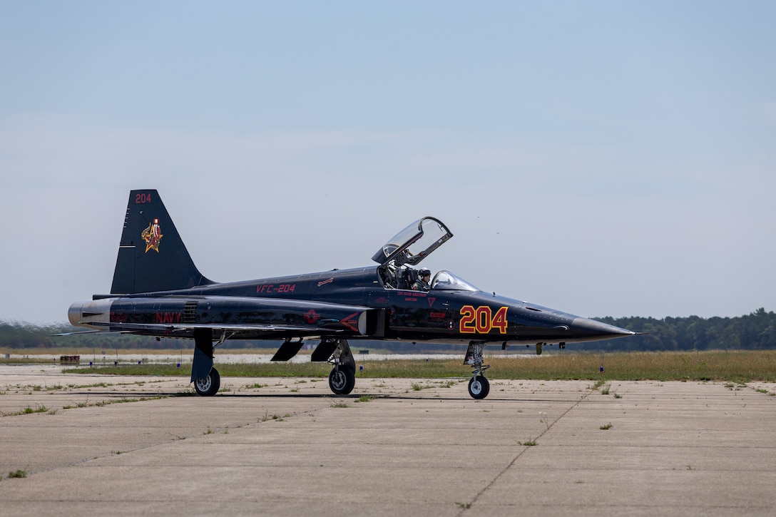 U.S. Marine Corps Maj. Erin Mathis, an operation officer with Marine Fighter Training Squadron (VMFT) 402, Marine Aircraft Group 41, 4th Marine Aircraft Wing, lands an F-5N Tiger II aircraft during Atlantic Alliance 2025 at Joint Base Cape Cod, Massachusetts, July 3, 2025. VMFT-402’s purpose in Atlantic Alliance is to support and enhance Navy-Marine Corps amphibious operations by providing advanced fighter training and integrating air combat capabilities into joint and allied exercises along the East Coast. (U.S. Marine Corps photo by Sgt. Emely Gonzalez)