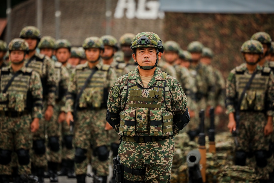 Malaysian Army soldiers stand in formation during the opening ceremony of Exercise Keris Strike 25, July 17, 2025, in Perak, Malaysia. T