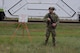 Senior Airman Drake Bruns, 91st Missile Security Operations Squadron defender guards the National Defense Area on Minot Air Force Base, North Dakota, July 11, 2025. Bruns guarded a convoy during the Bully Vigilance 25-1 exercise. Exercises like this allow Airmen to demonstrate their skills under the stress of a combat environment.