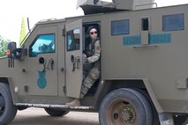 Airman 1st Class Abigail Goodner, 91st Missile Security Operations Squadron defender, checks her surroundings on Minot Air Force Base, North Dakota July 11, 2025. Goodner served as a member of the fire observers during the Bully Vigilance 25-1, an exercise designed to demonstrate the proficiency of defenders during a convoy.