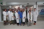250623-N-FT324-6565 ROTA, SPAIN (June 23, 2025). Capt. Michael Mercado, Director of U.S. Naval Hospital Rota, engages with staff during a tour of Hospital Universitario Puerta del Mar, focusing on enhancing collaborative healthcare efforts and reinforcing the vital partnership that supports warfighters and their families overseas. (U.S. Navy Photo Released by Lt. Cmdr. Alicia Sacks)