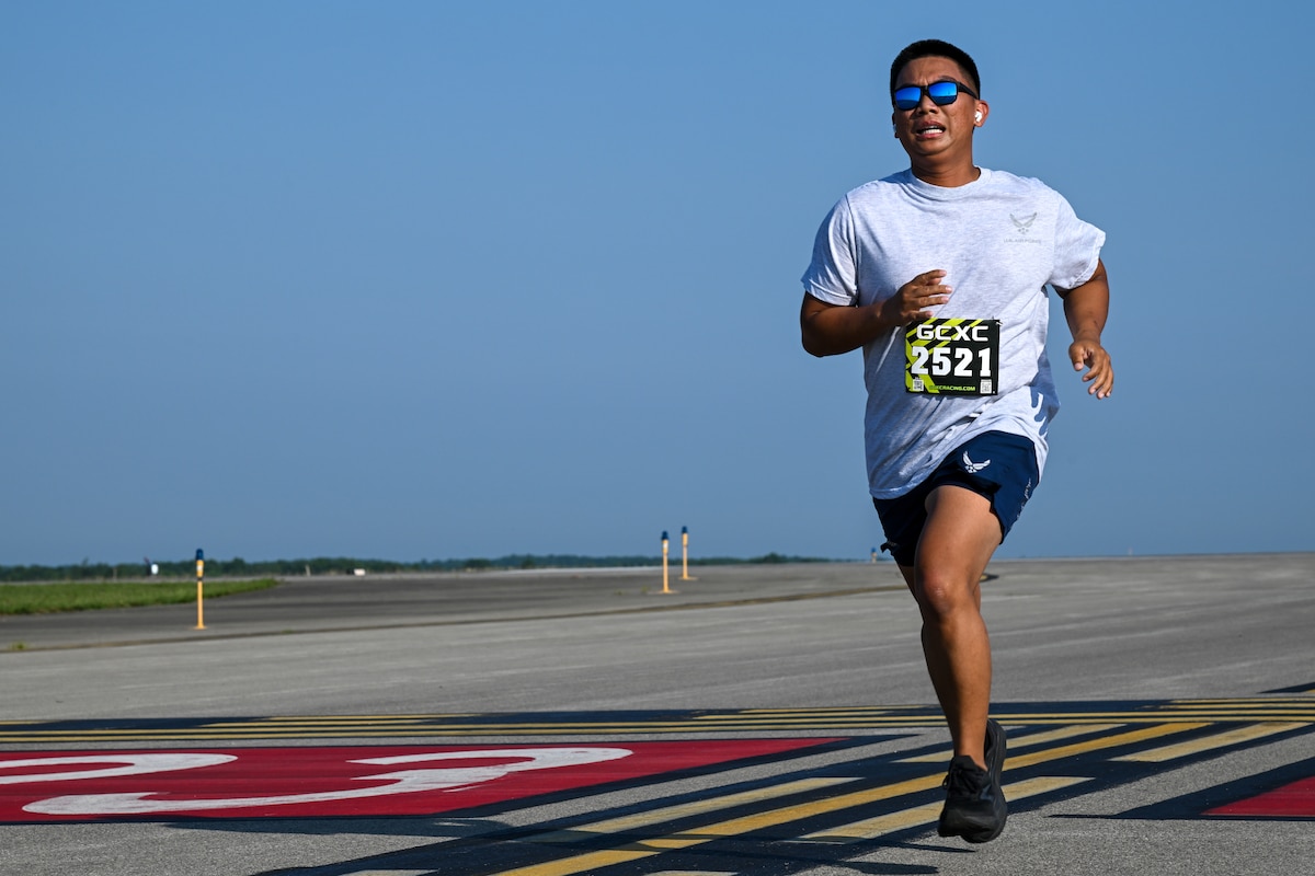An Airman from the 910th Airlift Wing, Youngstown Air Reserve Station, Ohio, runs toward the finish line during the '5K on the Runway' event at Youngstown-Warren Regional Airport, July 12, 2025.
