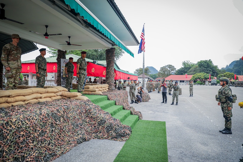 U.S. and Malaysian military leaders observe a formal honors ceremony during the opening of Exercise Keris Strike 25, July 17, 2025, in Perak, Malaysia.