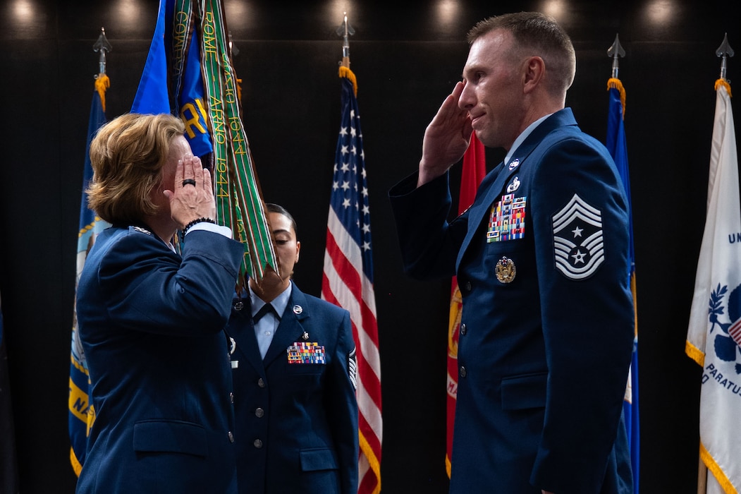 U.S. Air Force Chief Master Sgt. Derek Neill, 17th Training Wing command chief, salutes Col. Angelina Maguinness, 17th TRW commander, after assuming responsibility during the change of responsibility ceremony at the Powell Event Center, Goodfellow Air Force Base, Texas, July 16, 2025. As command chief, Chief Neill will serve as the principal advisor to the 17th TRW commander on all matters concerning the readiness, professional development, utilization and effectiveness of the wing’s enlisted Airmen. (U.S. Air Force photo by Airman 1st Class Brian Lummus)