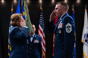 U.S. Air Force Chief Master Sgt. Derek Neill, 17th Training Wing command chief, salutes Col. Angelina Maguinness, 17th TRW commander, after assuming responsibility during the change of responsibility ceremony at the Powell Event Center, Goodfellow Air Force Base, Texas, July 16, 2025. As command chief, Chief Neill will serve as the principal advisor to the 17th TRW commander on all matters concerning the readiness, professional development, utilization and effectiveness of the wing’s enlisted Airmen. (U.S. Air Force photo by Airman 1st Class Brian Lummus)