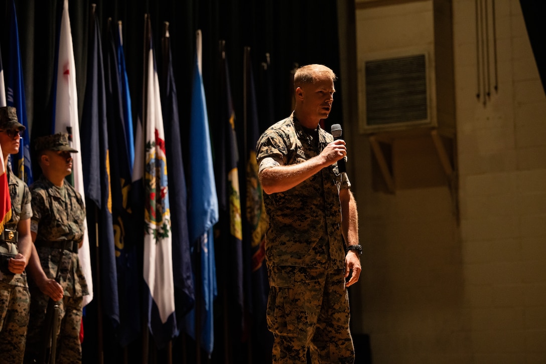 U.S. Marine Corps Col. Thomas Farrington II, incoming commanding officer, Marine Corps Air Station (MCAS) New River, gives his remarks during a change of command ceremony at MCAS New River in Jacksonville, North Carolina, July 17, 2025. The ceremony represented the transfer of responsibility, authority and accountability from the outgoing to the incoming commanding officer. (U.S. Marine Corps photo by Cpl. Loriann Dauscher)
