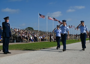 U.S. Air Force Colonel Thomas Wilson, 17th Training Wing deputy commander, salutes U.S. Air Force Col. Matthew Norton, 17th TRW commander, during the change of command ceremony at Goodfellow Air Force Base, Texas, July 17, 2025. The pass in review is a long standing military tradition dating back to when Baron Von Steuben arrived at Valley Forge and reported to Washington during the American Revolution in 1778. (U.S. Air Force photo by Staff Sergeant Nathan Call)
