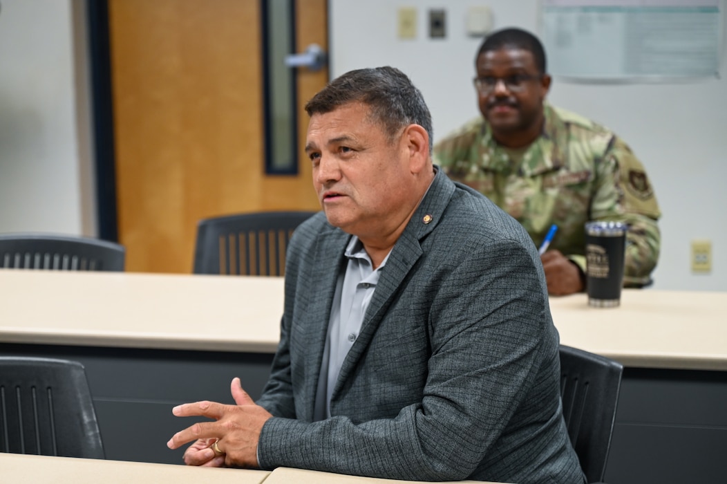 Retired Chief Master Sgt. Emil Garza, the fourth 433rd Airlift Wing command chief, shares leadership lessons with a group of 433rd AW senior enlisted leaders during a mentoring session follow the revival of the Jeep Chief tradition in the Alamo Wing at Joint Base San Antonio-Lackland, Texas, July 12, 2025.