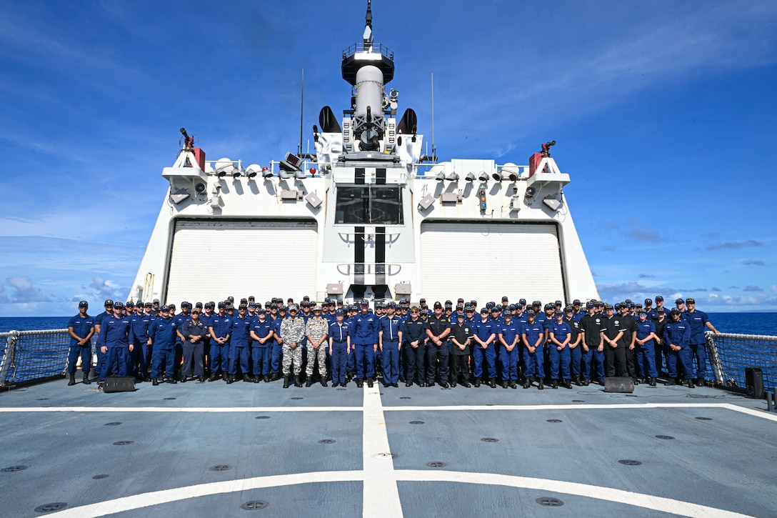 Quad partners from the U.S. Coast Guard, Japan Coast Guard, Australian Border Force, Indian Coast Guard and the command and crew of the Legend-class U.S. Coast Guard Cutter Stratton (WMSL 752) take a photo on the flight deck during the first Quad at-sea mission while Stratton patrols the Pacific Ocean, July 1, 2025. Stratton is deployed and assigned to Destroyer Squadron (DESRON) 15, the Navy’s largest DESRON and the U.S. 7th Fleet’s principal surface force. Stratton is deployed to the Indo-Pacific to advance relationships with ally and partner nations to build a more secure and prosperous region with unrestricted, lawful access to the maritime commons. (U.S. Coast Guard photo by Petty Officer 2nd Class Kate Kilroy)