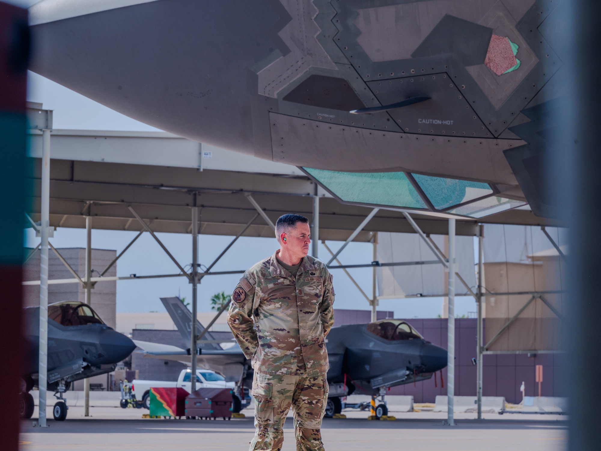 U.S. Air Force Chief Master Sgt. Jason Shaffer, 56th Fighter Wing command chief, prepares to launch a jet on the flightline, July 16, 2025, at Luke Air Force Base, Arizona.