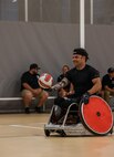 U.S. Army veteran J.P. Lane warms up before the wheelchair rugby practice during the 2025 Department of Defense Warrior Games practice sessions at Fort Carson, Colorado, July 14, 2025.