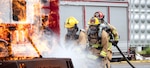 TOKYO, Japan (July 5, 2025) — U.S. Air Force firefighters assigned to the 169th Civil Engineer Squadron’s fire department and the 374th Civil Engineer Squadron’s fire department conduct car burn procedures during a deployment for training course at Yokota Air Base, Japan, July 5, 2025. This joint collaboration allowed Airmen and local partners to develop advanced skillsets, target potential stress points, and foster unit cohesion for maximum efficiency in the case of a real-world event. (U.S. Air National Guard photo by Staff Sgt. Danielle Dawson)