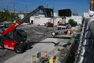 Personnel from USCGC Resolute (WMEC 620) offload pallets of illicit narcotics during a drug offload at Coast Guard Sector St. Petersburg, July 17, 2025. During the patrol, Resolute was joined by the cutters Escanaba, Tahoma, and Hamilton, providing broad, coordinated coverage across the major drug-smuggling vectors running from Ecuador towards the United States. (U.S. Coast Guard photo by Petty Officer 1st Class Riley Perkofski)