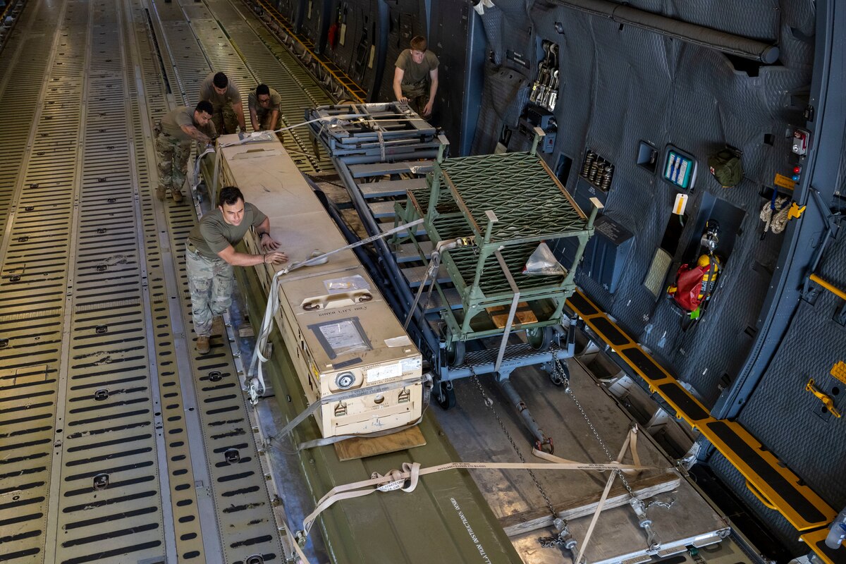 U.S. Air Force Airmen assigned to the 730th Air Mobility Squadron unload cargo from a C-5M Super Galaxy aircraft during exercise Resolute Force Pacific (REFORPAC) 2025 at Misawa Air Base, Japan, July 16, 2025.