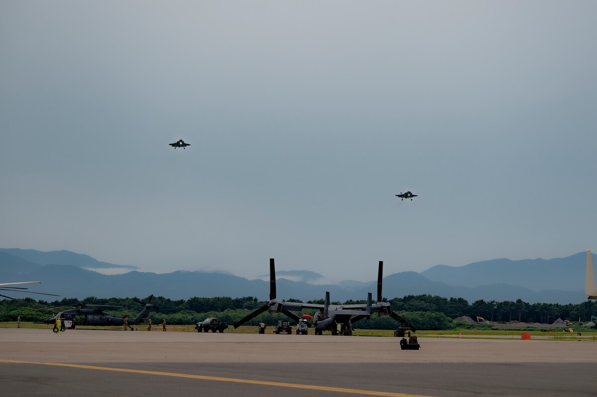 Two U.S. Air Force F-35 Lighting II’s assigned to the 421st Fighter Squadron prepare to land during exercise Resolute Force Pacific (REFORPAC) 2025 at Misawa Air Base, Japan, July 15, 2025. REFORPAC tests agile combat employment, logistics resilience and partner integration through degraded communications and real-time force dispersal drills. (U.S. Air Force photo by Senior Airman Brittany Russell)